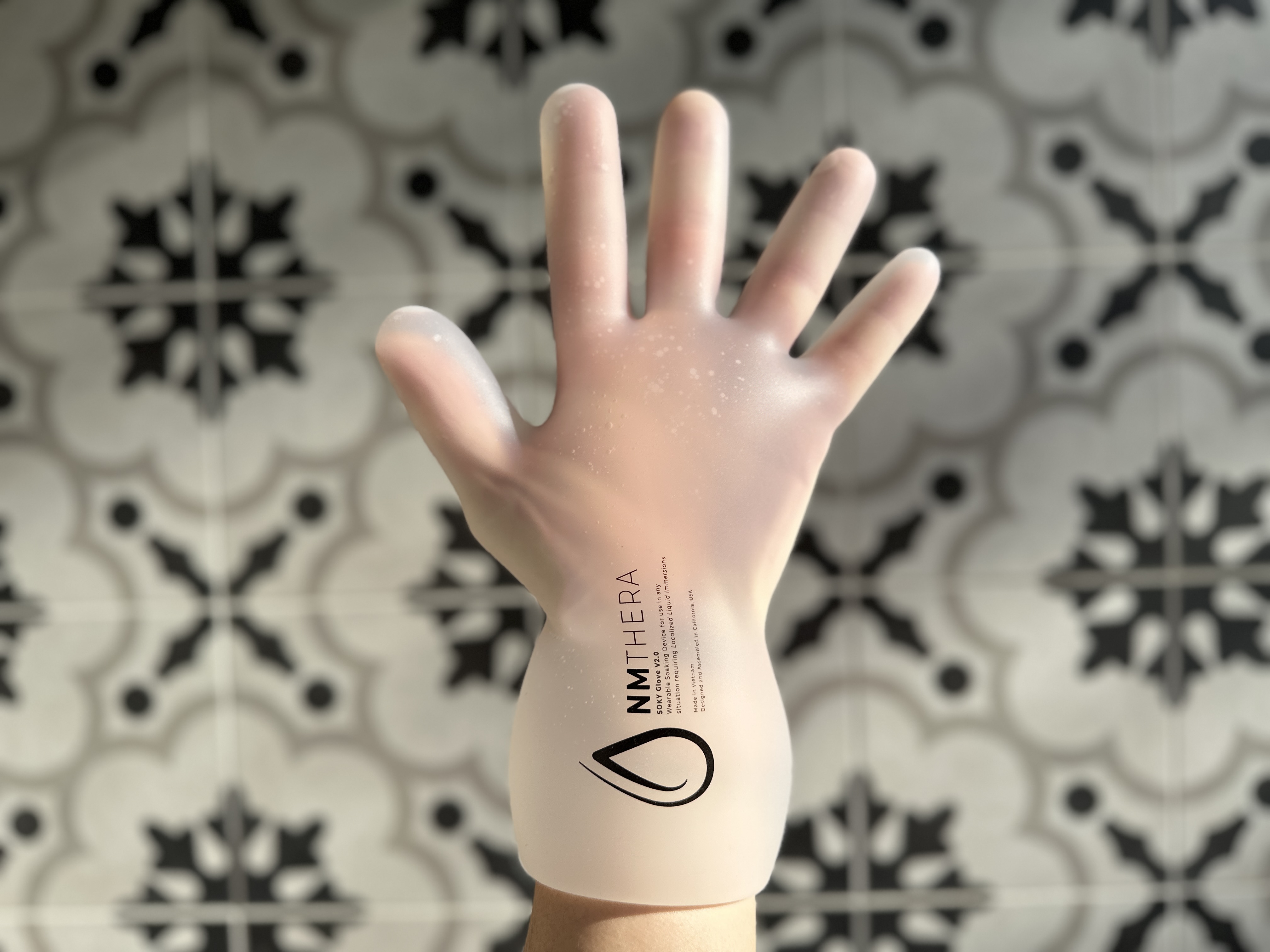 SOKY against spa tile backdrop